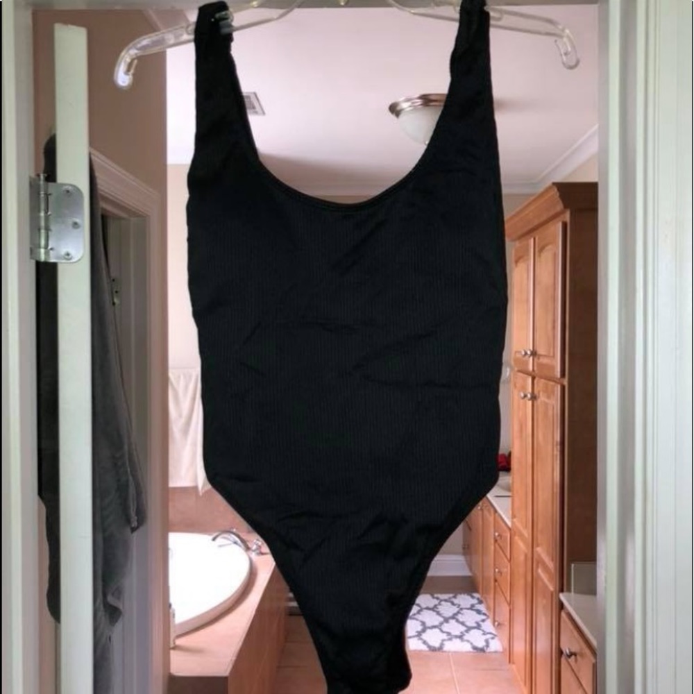 High bikini line swimsuit, low back. Brand new!